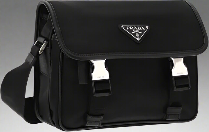 Black Prada bag with a silver logo on a white background