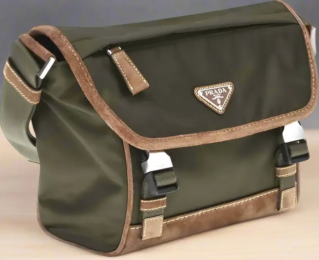 Green and brown Prada bag on a white background