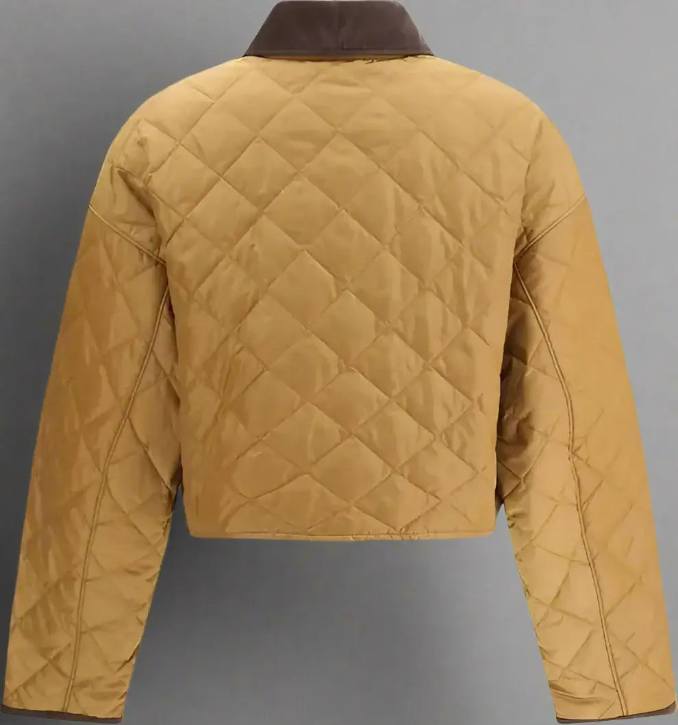 Quilted beige jacket on a white background