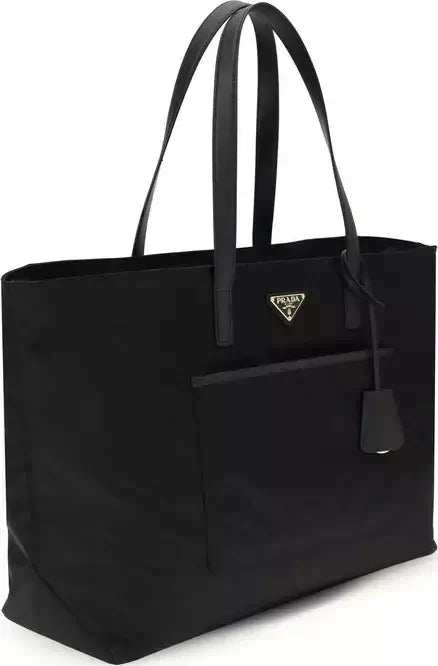 Black tote bag with Prada logo on a white background