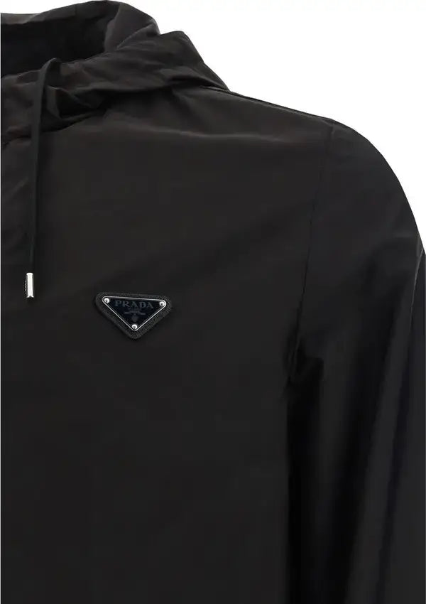 Black jacket with Prada logo on a white background