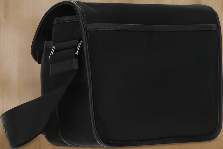 Black shoulder bag on a white background