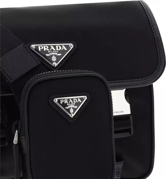 Black Prada bag with visible brand logo on a white background