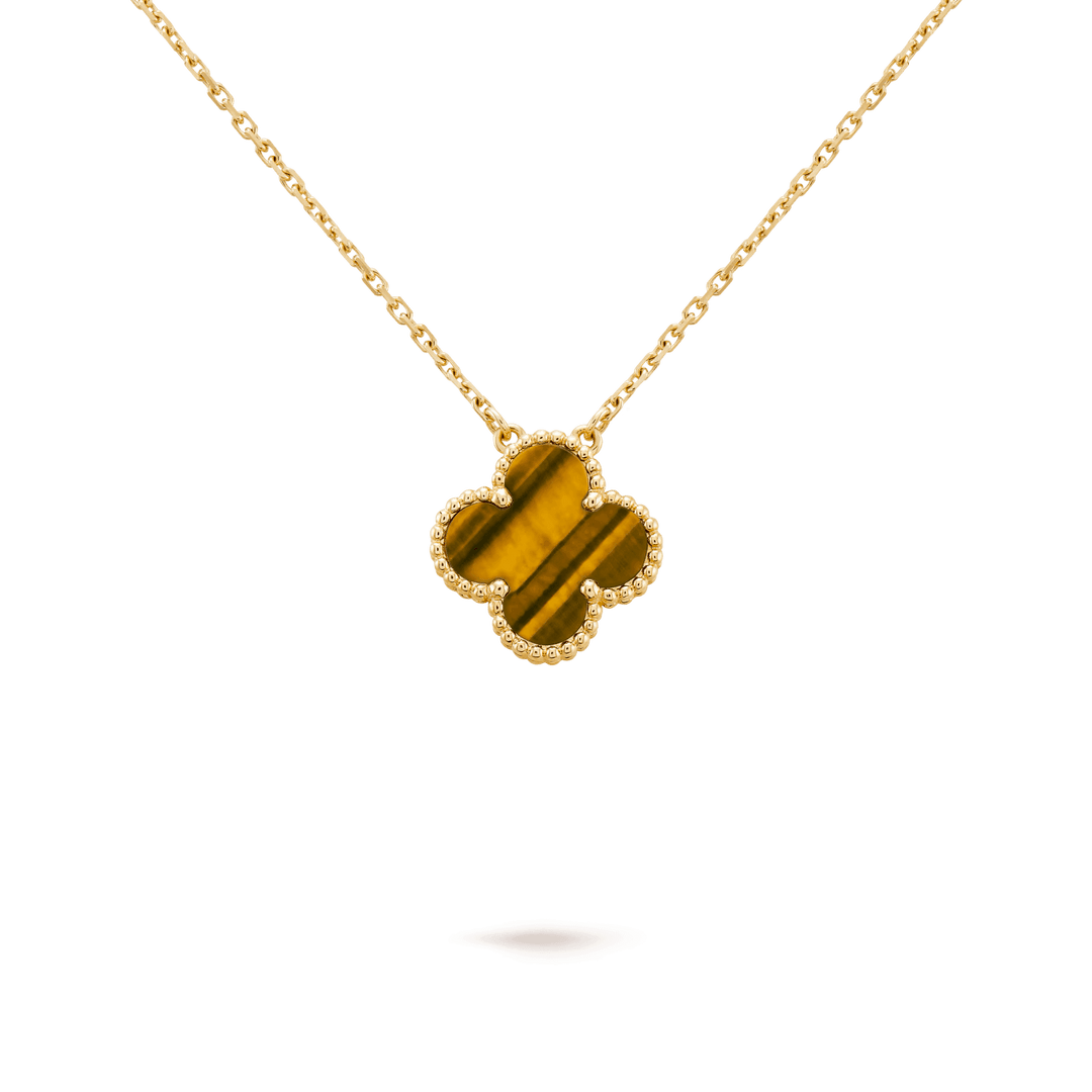 Van Cleef & Arpels Vintage Alhambra pendant 18K yellow gold, Tiger Eye in fine jewelry