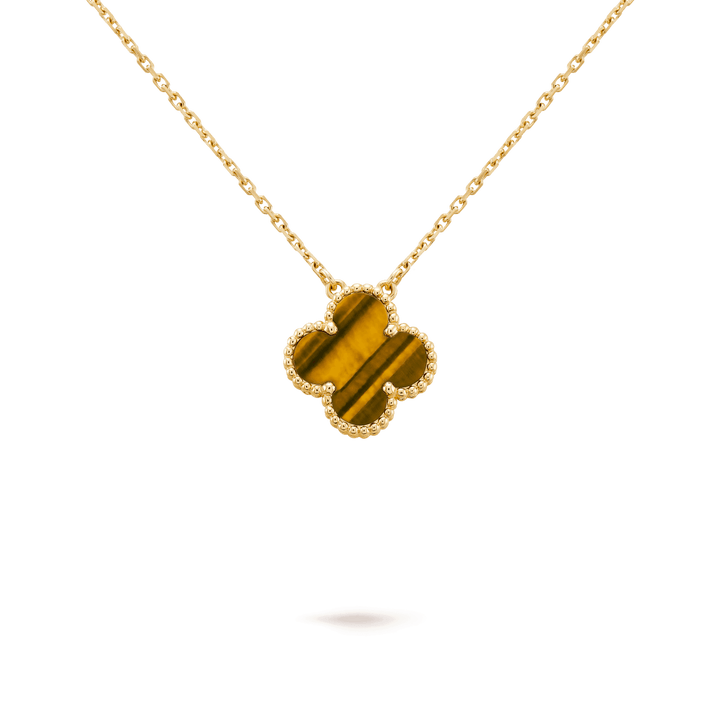 Van Cleef & Arpels Vintage Alhambra pendant 18K yellow gold, Tiger Eye in fine jewelry