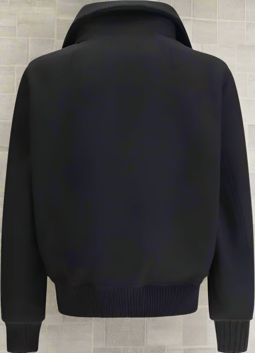 back of black jacket with raised collar