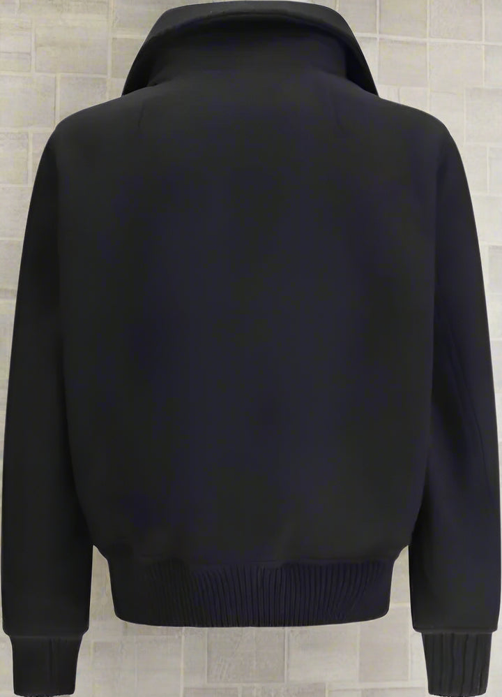 back of black jacket with raised collar