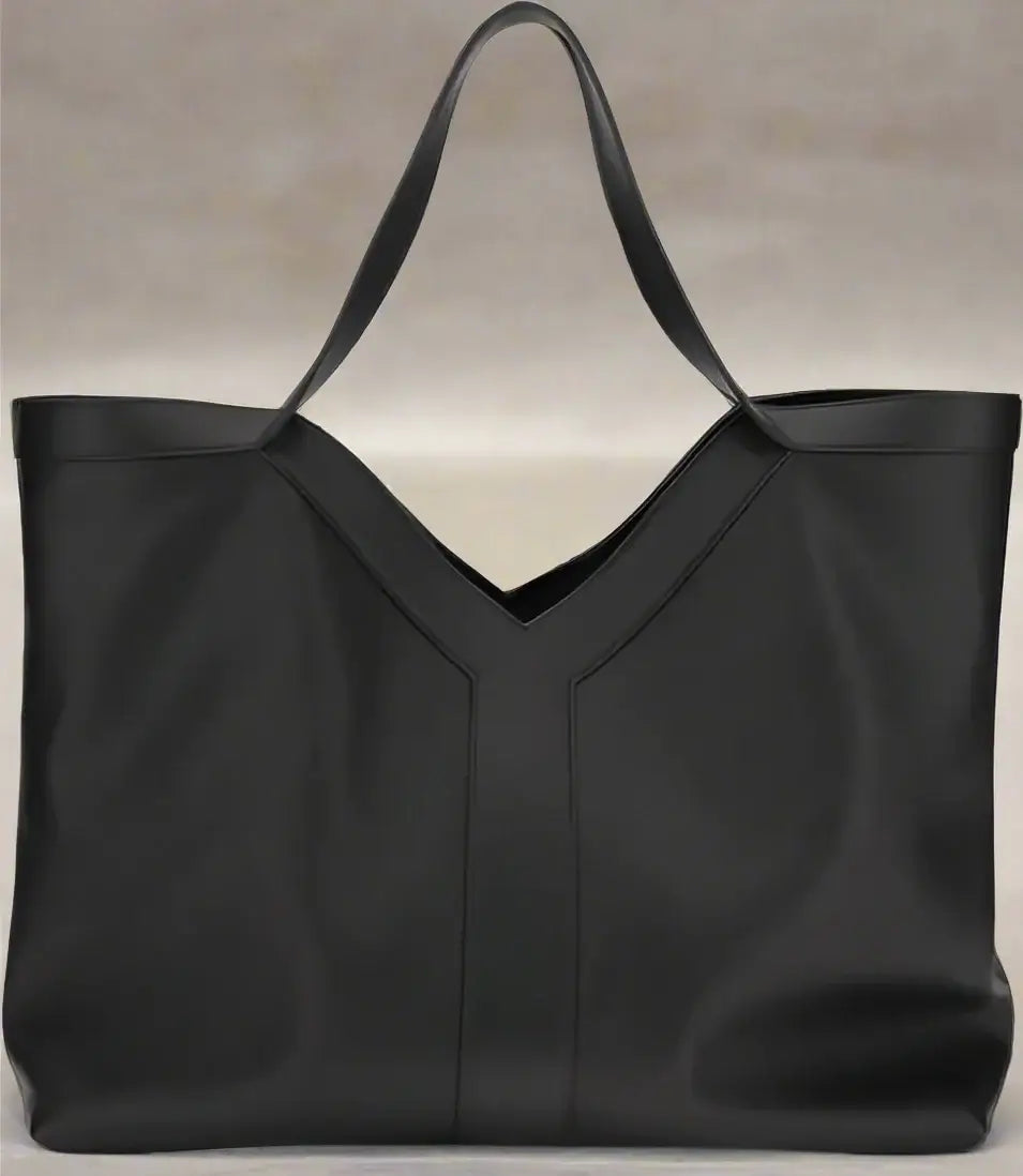 Black tote bag with a V-neckline on a white background