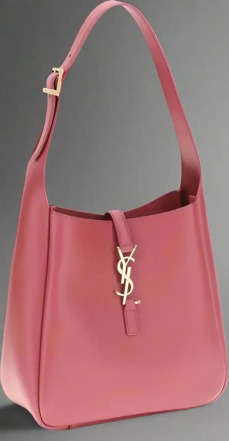Pink handbag with a gold logo on a white background