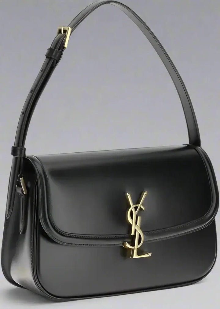 Black handbag with a gold logo on a white background