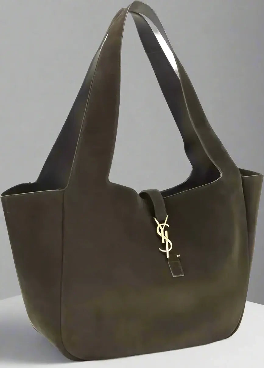 Dark brown handbag with a visible brand logo on a white background