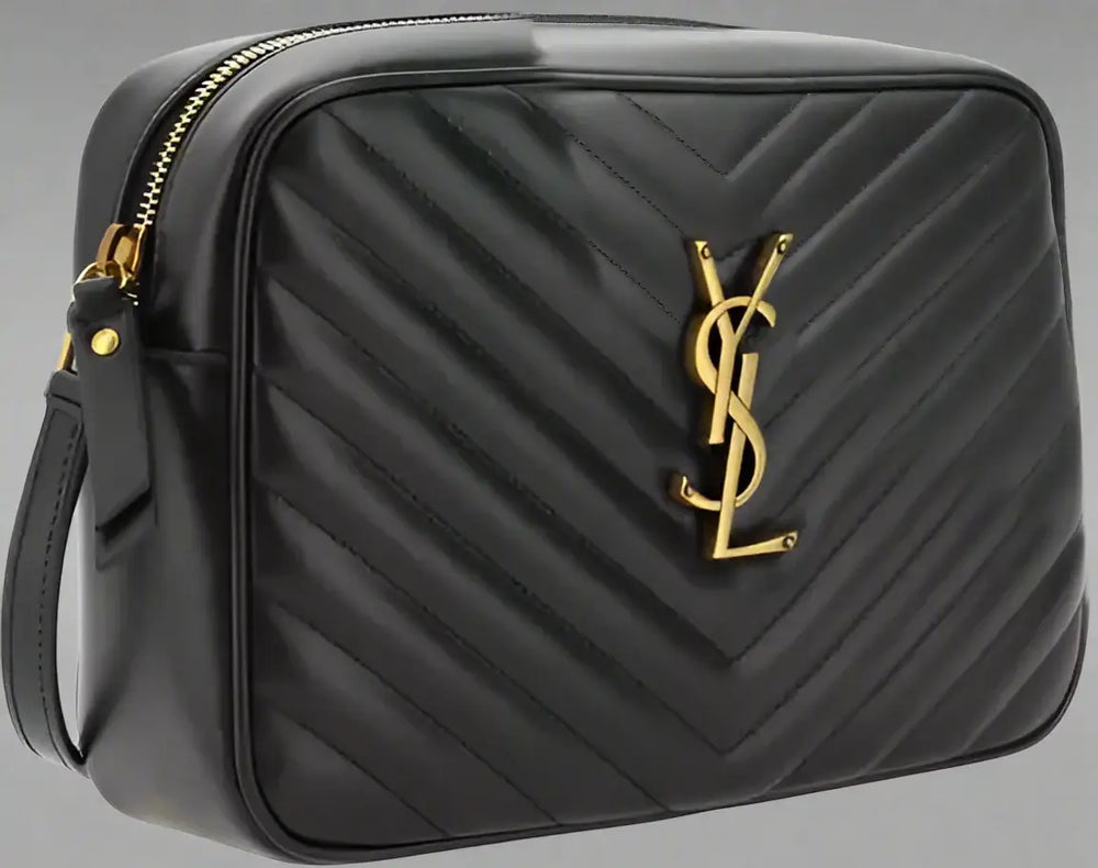 Black quilted handbag with gold logo on a white background