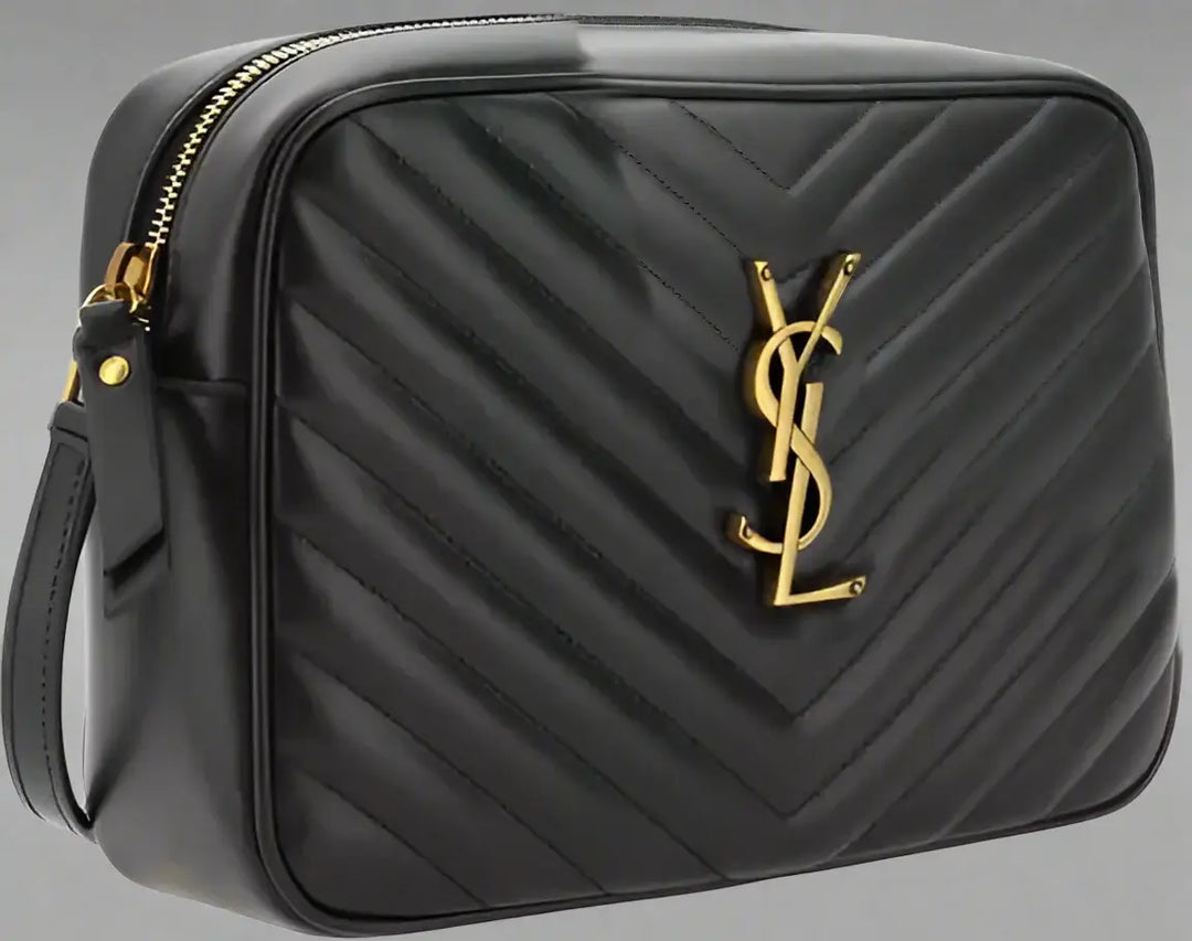 Black quilted handbag with gold logo on a white background