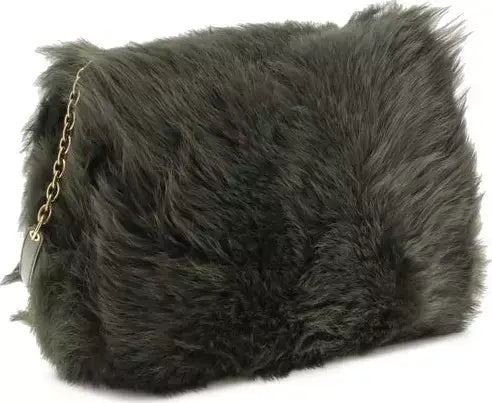 Fluffy dark green handbag with a gold chain on a white background