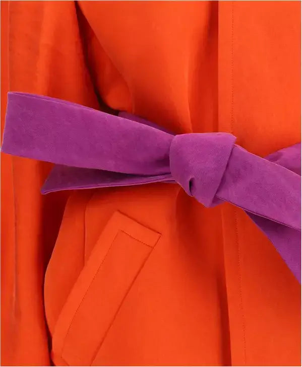 Orange garment with a purple belt