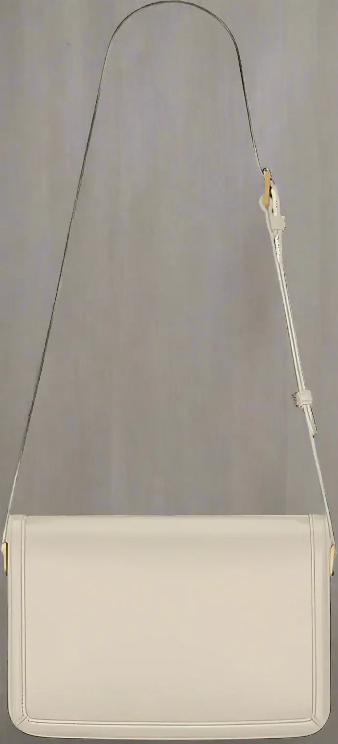 Beige crossbody bag with a strap on a white background