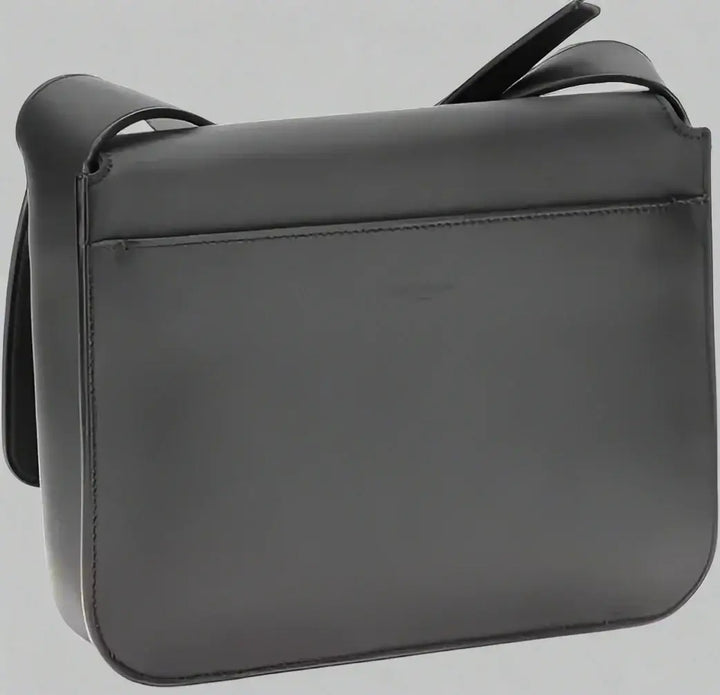 Black leather shoulder bag on a white background