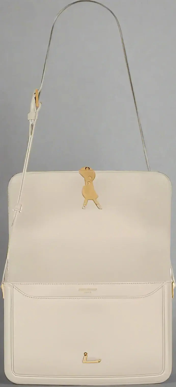 Beige handbag with a small dog emblem on a white background