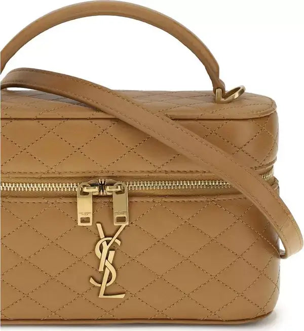 Quilted beige handbag with gold hardware on a white background