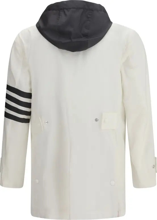 White coat with black hood and arm stripes on a white background