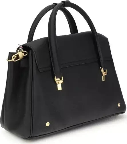 Black handbag with gold hardware on a white background