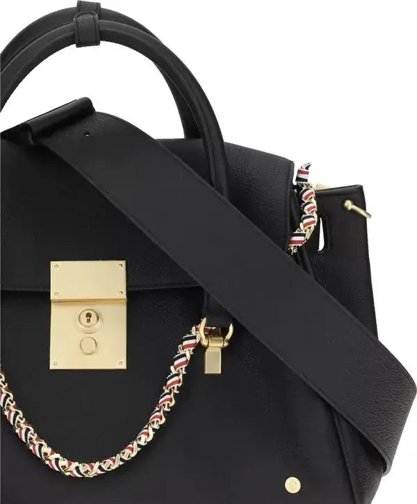Black handbag with gold lock and chain detail on a white background