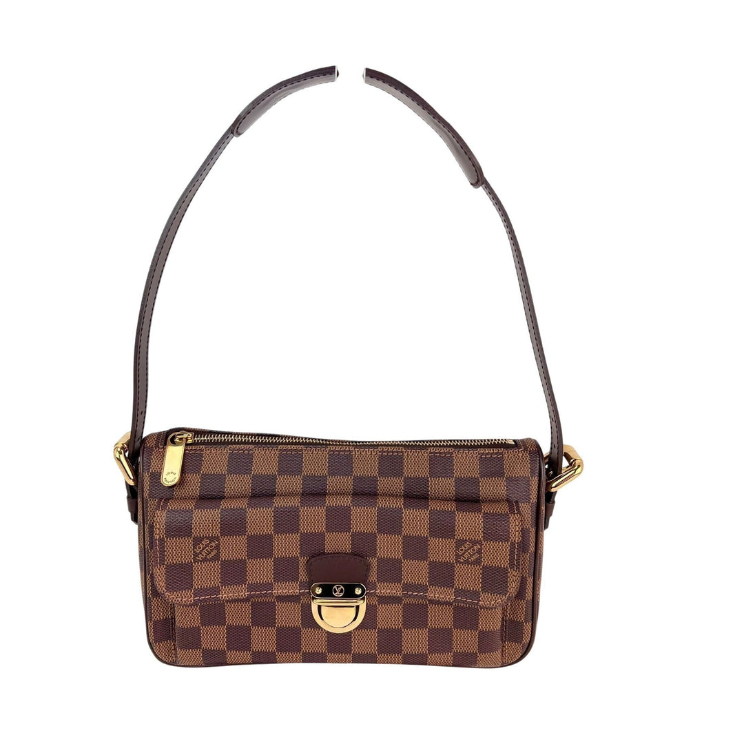 Brown checkered handbag with gold accents on a white background