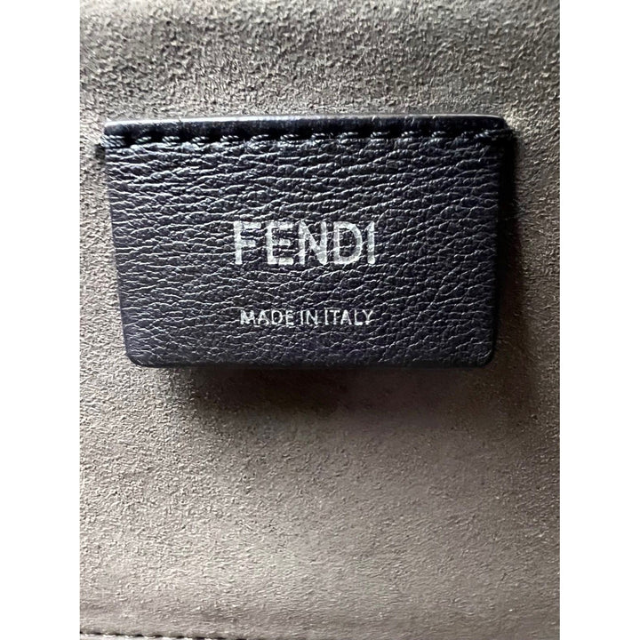 Fendi logo on a leather tag, showcasing authenticity for the Fendi F Kan 1 Medium Blue Leather Shoulder Hand Bag.