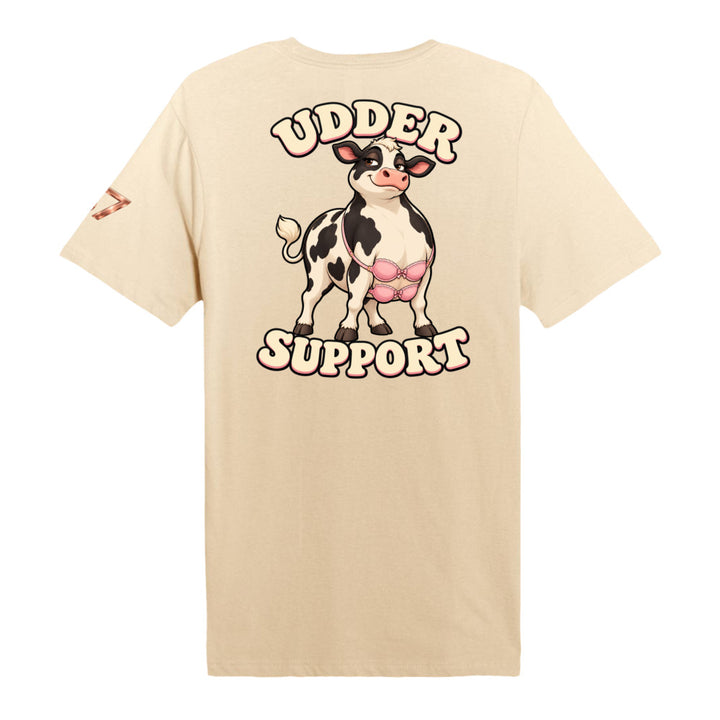 S7 Udder Support T-shirt featuring a smiling cartoon cow wearing two pink bras beneath bold cream-and-pink Udder Support lettering.