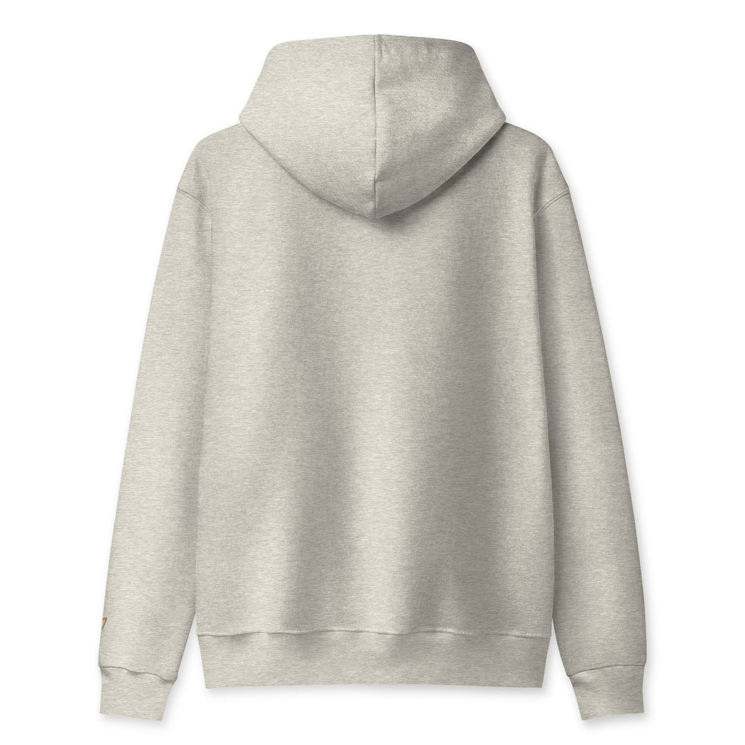 S7 heavyweight hoodie with an embroidered logo on the left chest, a smaller S7 mark at the left wrist, and a plain back.