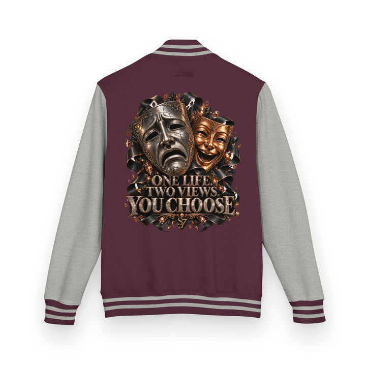 S7 “One Life, Two Views” Statement Varsity Jacket with dramatic dual masks and metallic artwork.
