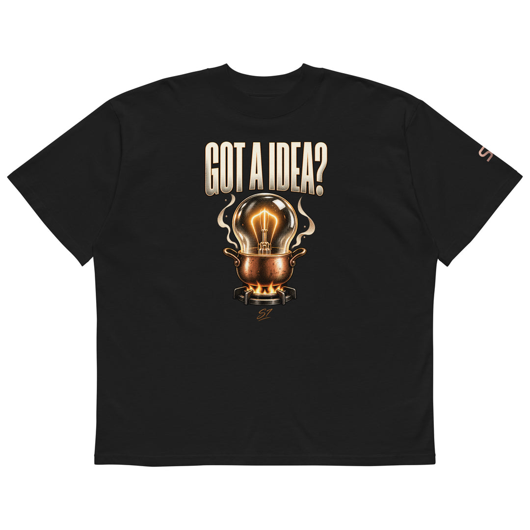 S7 “Got A Idea? Let It Cook” Graphic T-Shirt featuring a glowing bulb in a copper pot and bold lettering.
