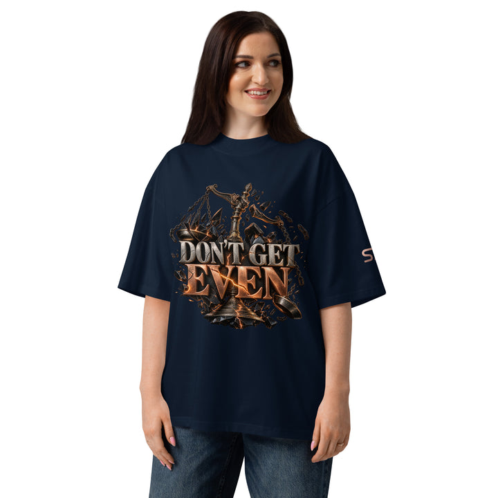 Woman wearing DON’T GET EVEN—GET BETTER Transformation T-Shirt | S7 in navy with bold front graphic.