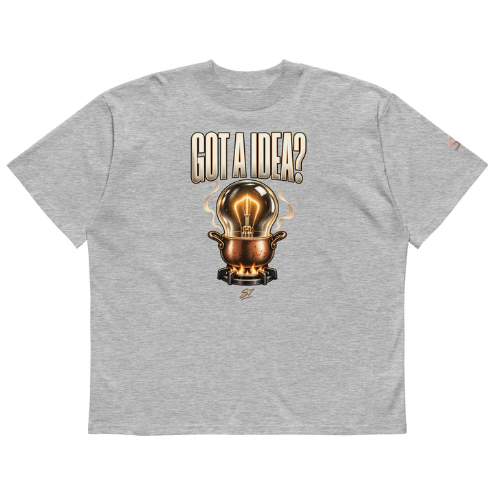 S7 “Got A Idea? Let It Cook” Graphic T-Shirt featuring a glowing bulb in a copper pot on a gray background.