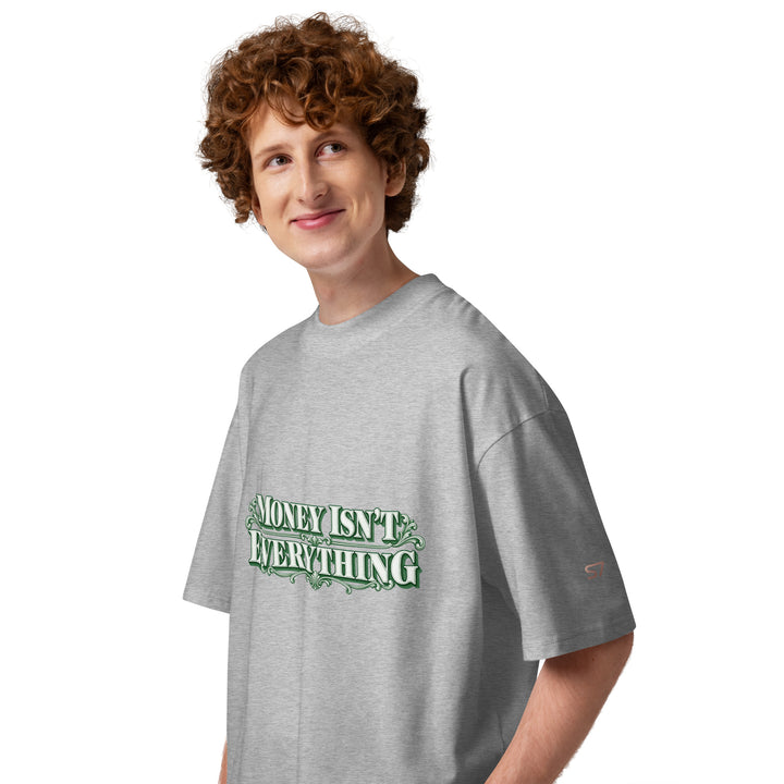 MONEY ISN’T EVERYTHING Graphic T-Shirt | S7 side view