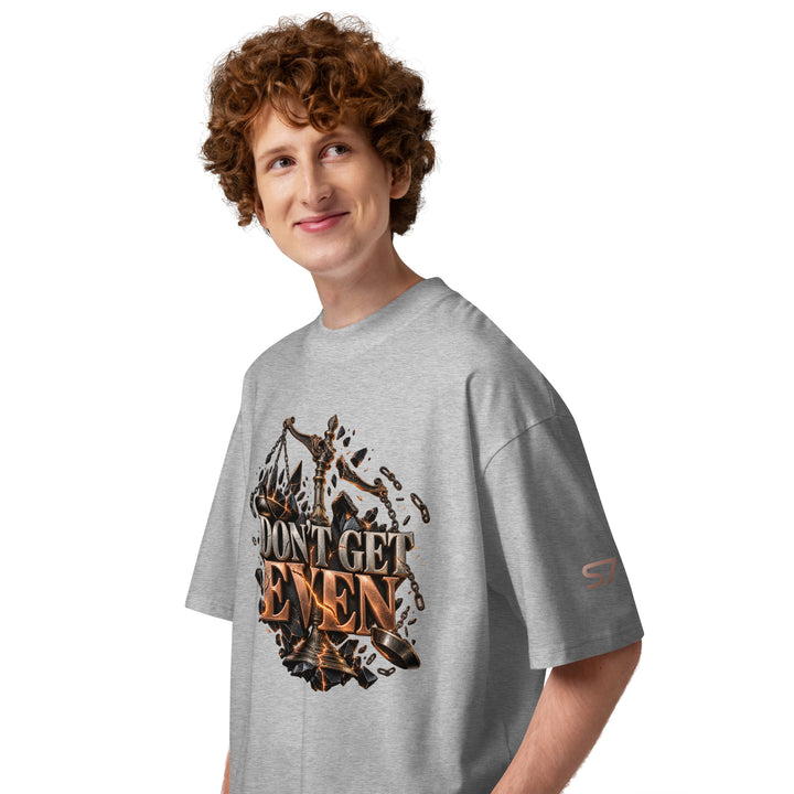 Model wearing DON’T GET EVEN—GET BETTER Transformation T-Shirt | S7 with front design featuring platinum and copper lettering.