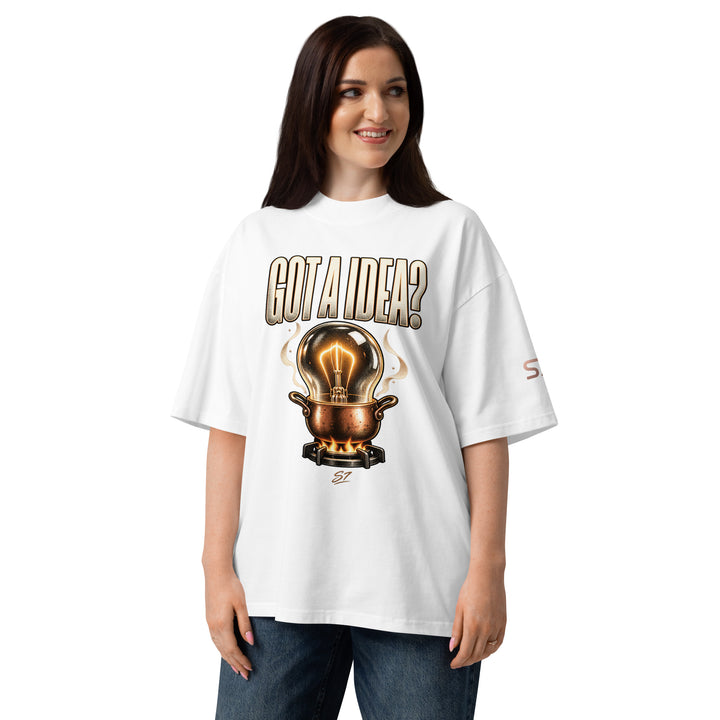 S7 “Got A Idea? Let It Cook” Graphic T-Shirt featuring a glowing bulb in a copper pot design on model.