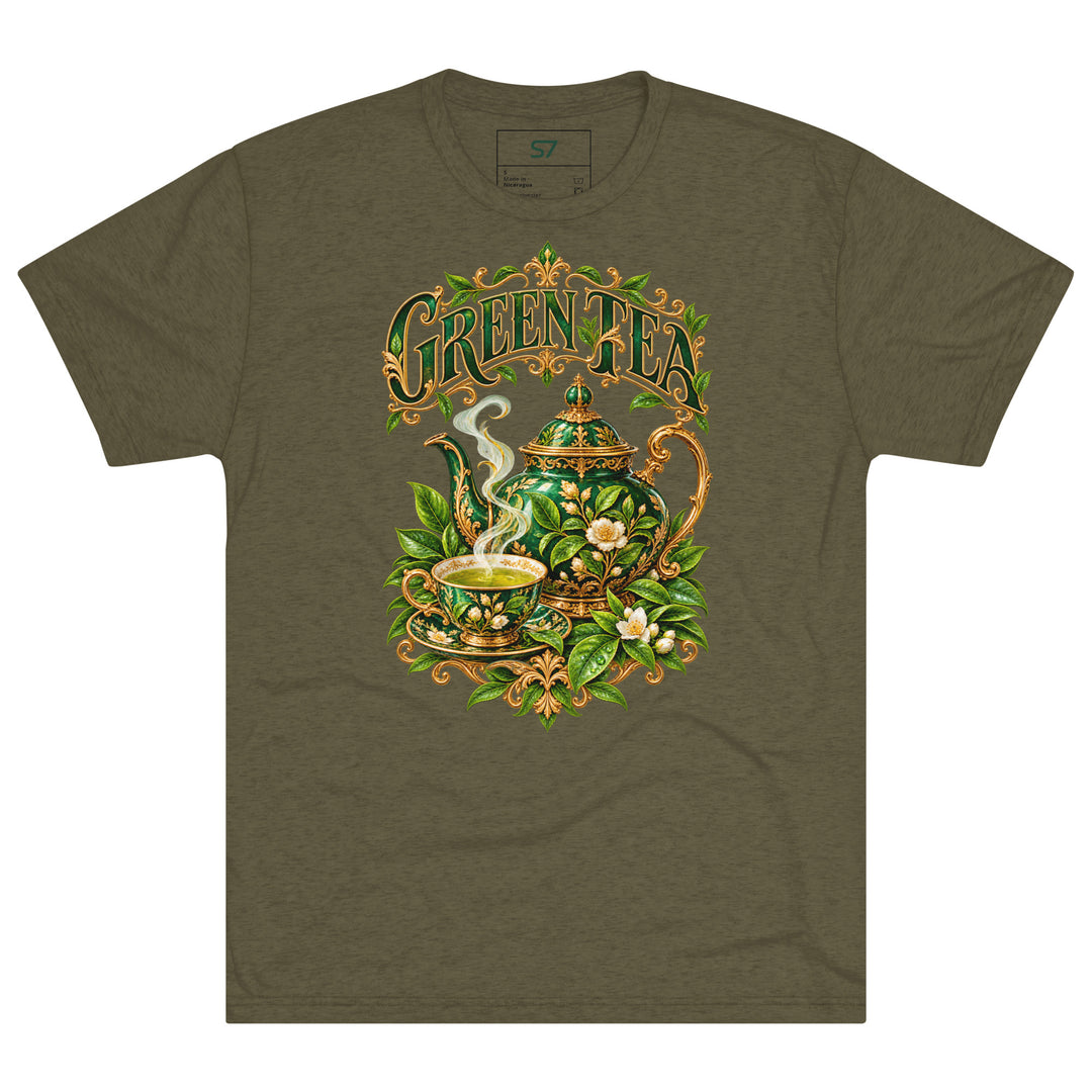 S7 Green Tea shirt featuring an ornate emerald teapot, matching teacup, botanical leaves, and gold-tone Green Tea lettering.