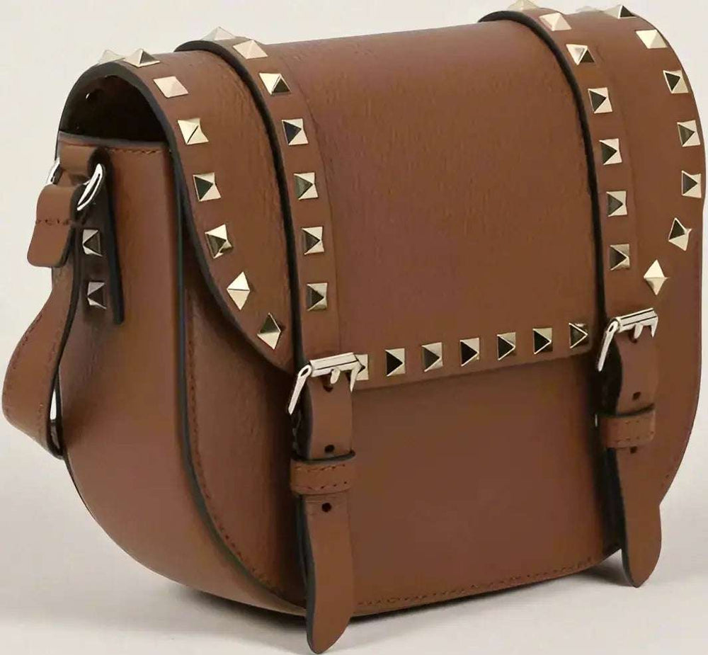 Valentino Garavani clothing, designer bags, and accessories collection at STORE 7994