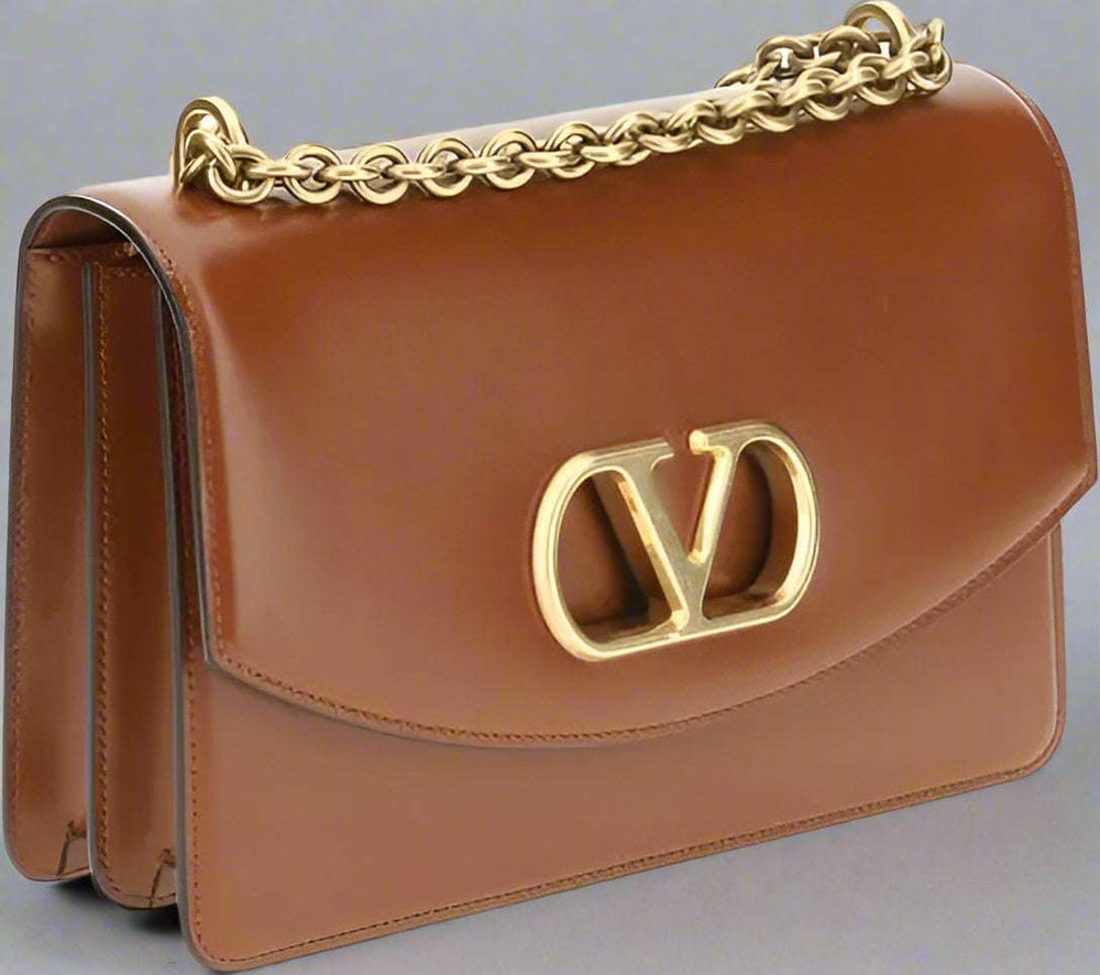 Valentino Garavani clothing, designer bags, and accessories collection at STORE 7994