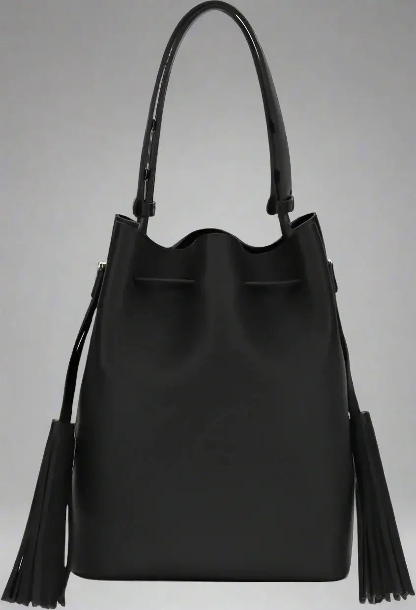 Black handbag with tassels on a white background