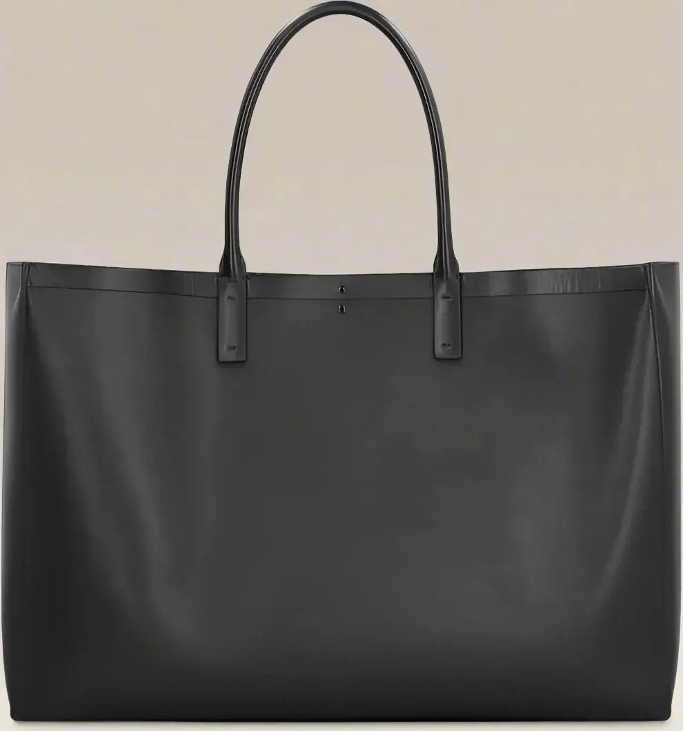 Black leather tote bag on a white background