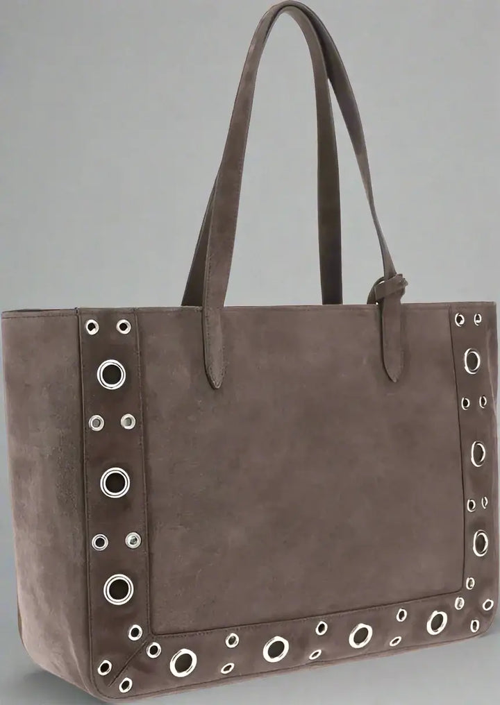 Gray tote bag with grommet details on a white background