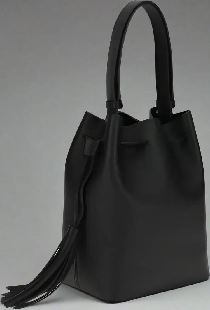 Black handbag with a drawstring on a white background