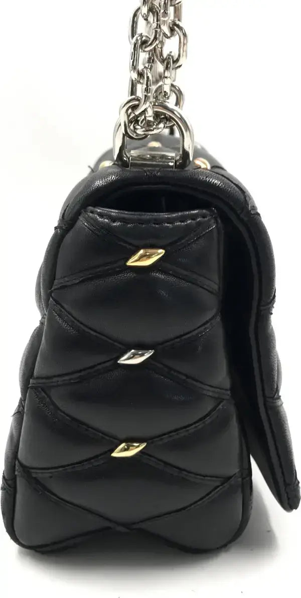 Black quilted handbag keychain with gold accents on a white background