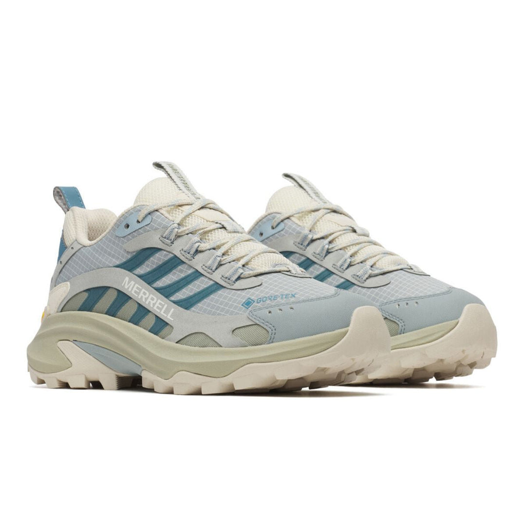Light blue and beige sneaker with striped pattern on a white background