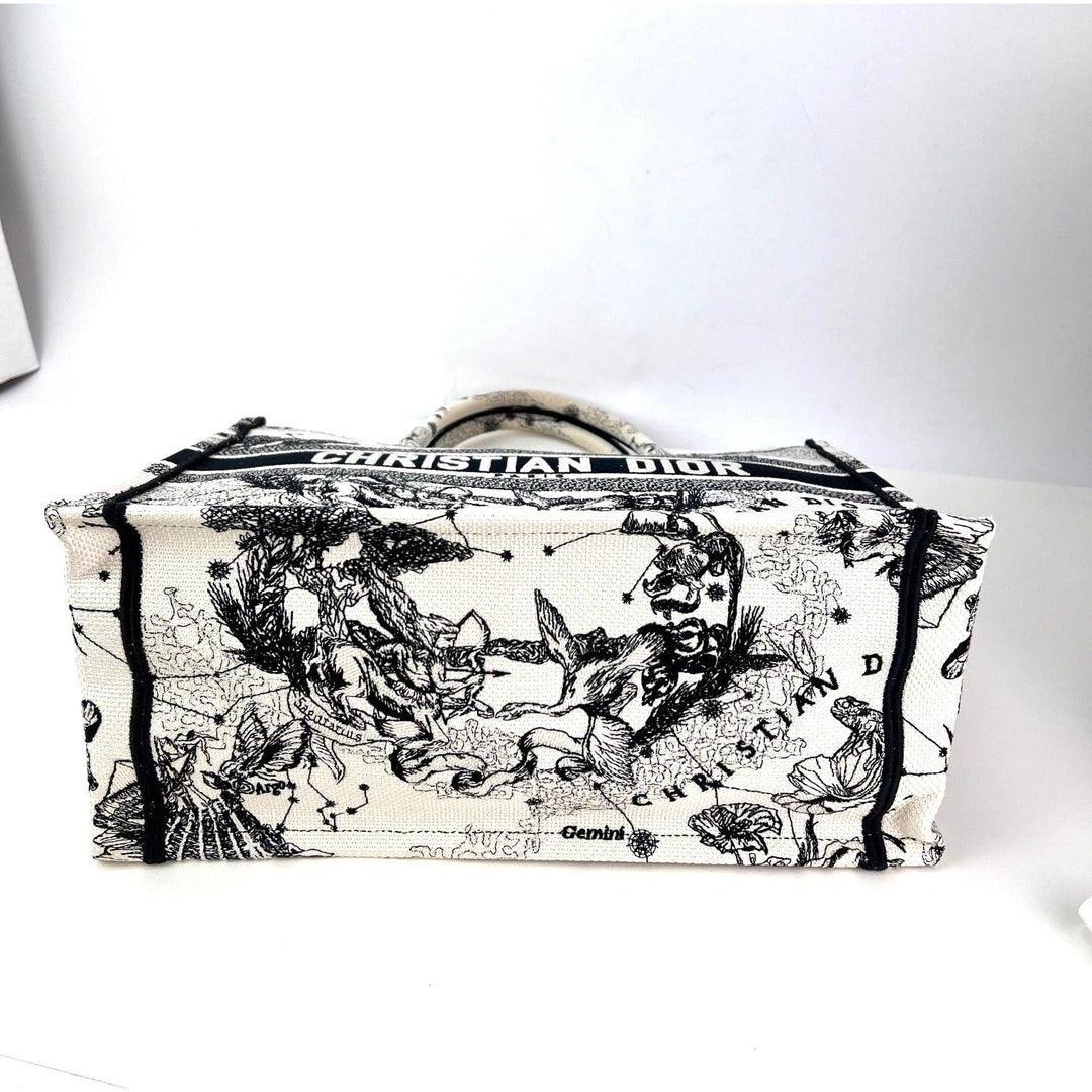Christian Dior Book Embroidered Canvas Medium Stars and Signs Black Tote showcasing detailed embroidery and luxury design.