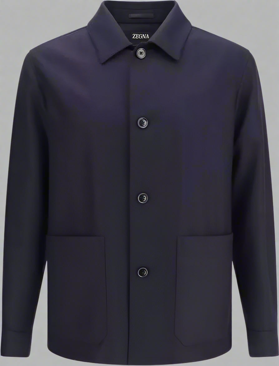 Navy blue jacket with button details on a white background