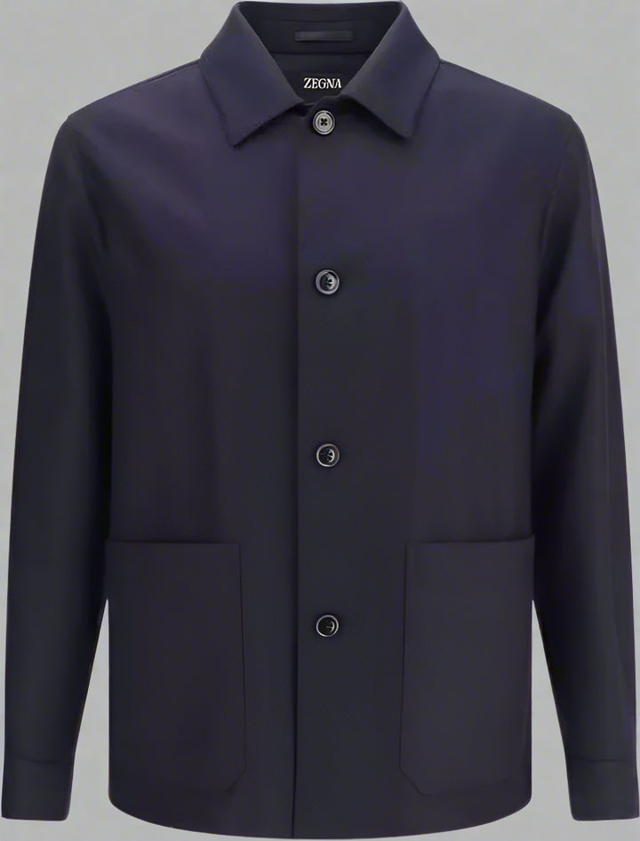 Navy blue jacket with button details on a white background